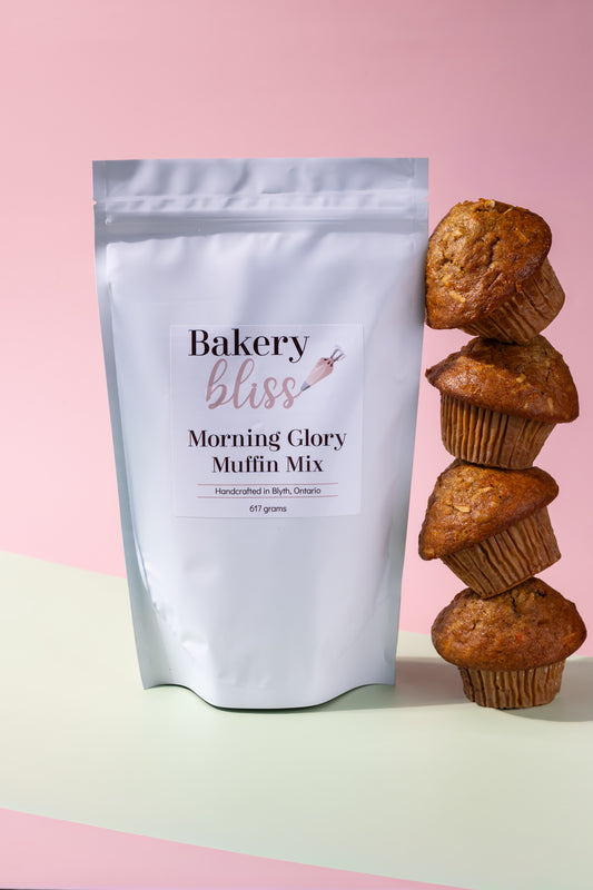 Bakery bliss Morning Glory Muffin Mix packaging with muffins on a pink and green background